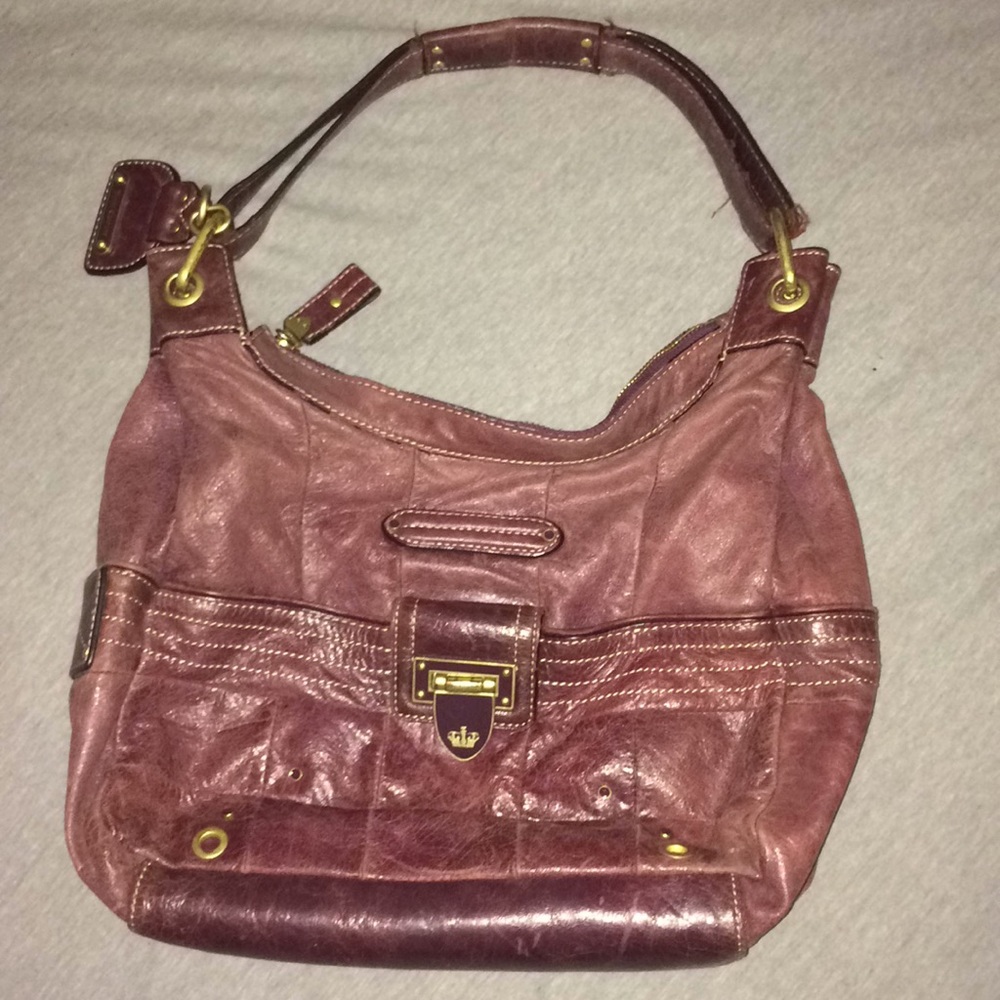 Purple 100% leather outside Juicy Couture Purse